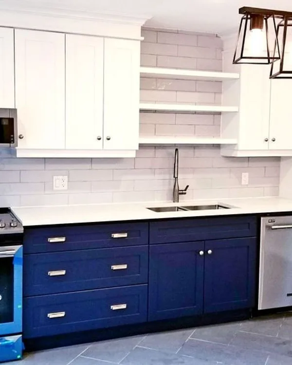 Central Guelph kitchen with navy lower cabinets and white uppers
