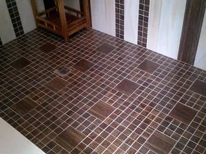 Wood look mosaic tile shower floor